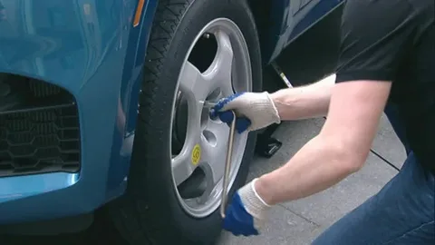 how to replace a flat tire without professional help
